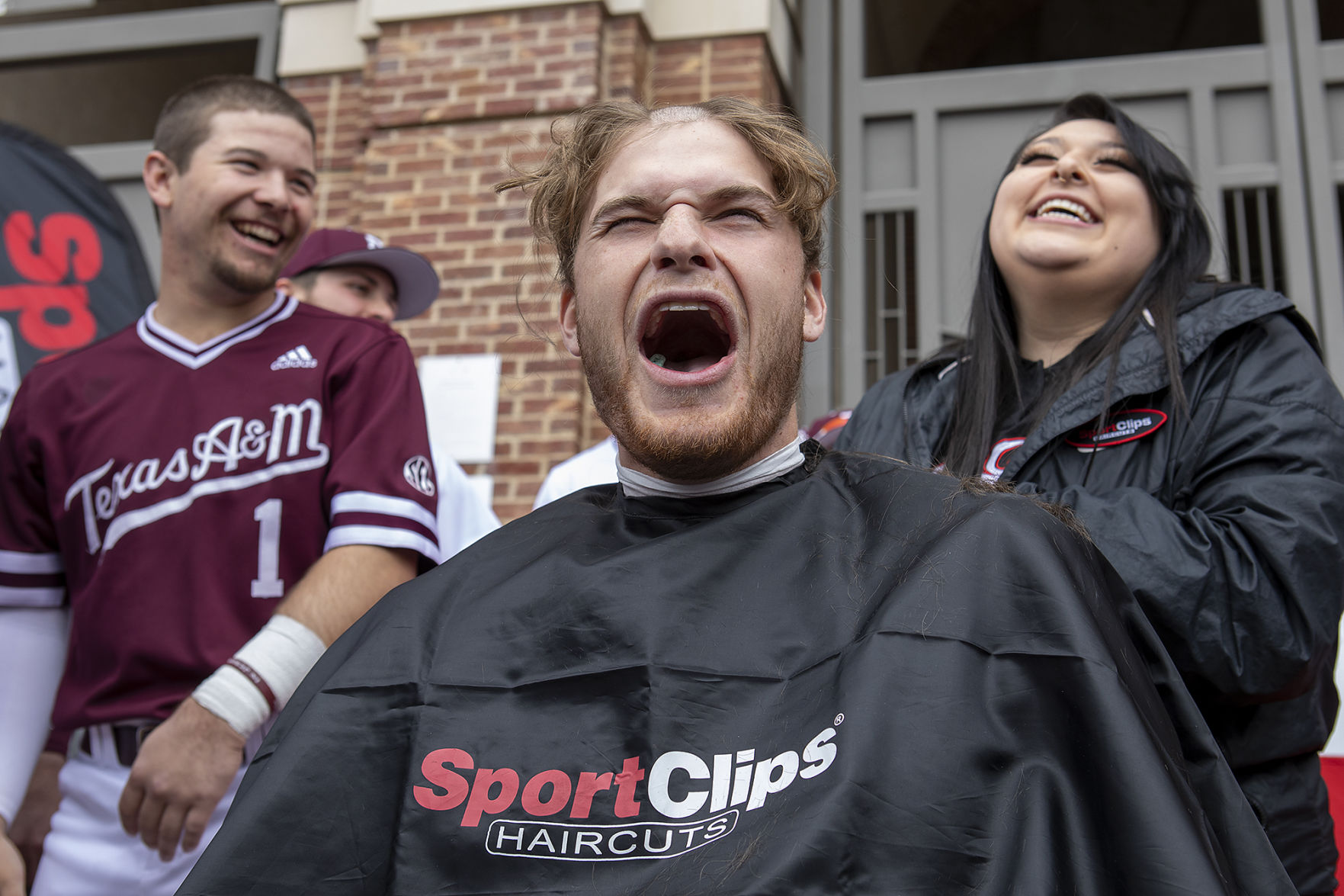 A&M baseball head shaving for cancer